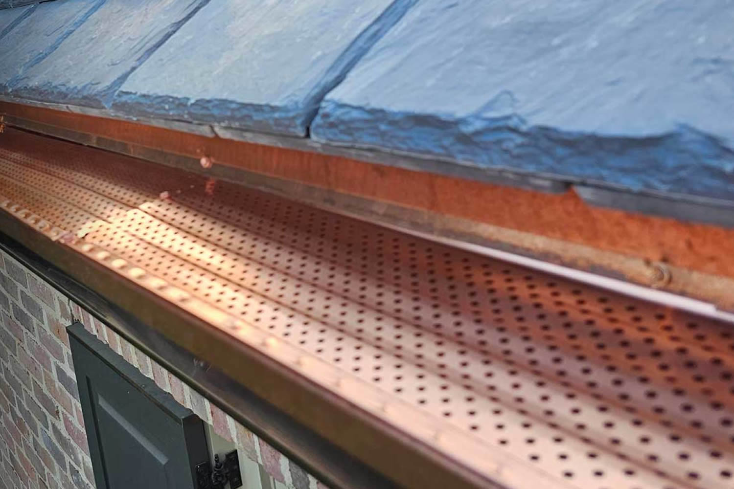 Shurflo-Gutter-Guard-installation-copper